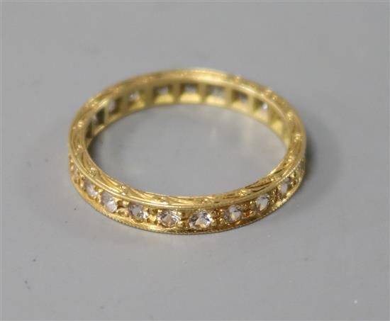 An 18ct gold and diamond set full eternity ring, size P.